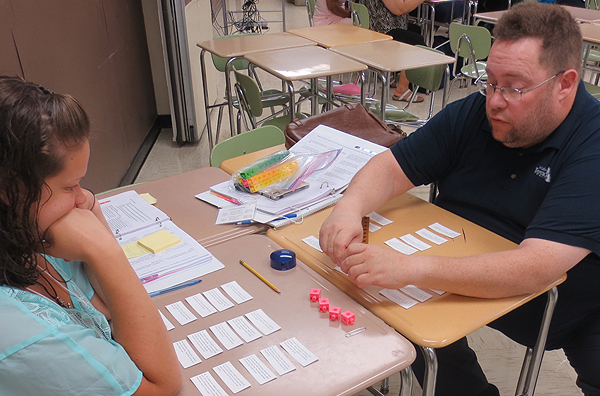 Teachers engaging in an activity.